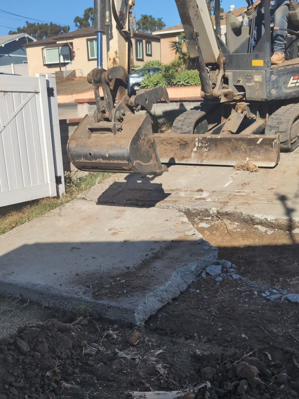 Concrete Demolition & Removal in San Diego: Breaking Cracked Slabs with Heavy Excavators