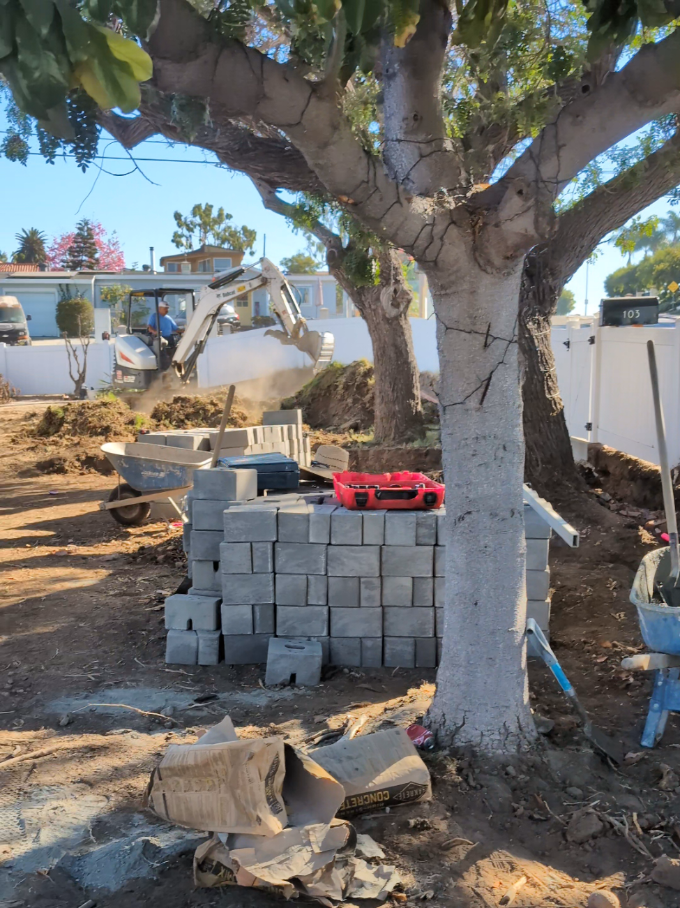 Site Excavation & CMU Block Retaining Wall Construction in San Diego: Foundation Prep & Earthmoving