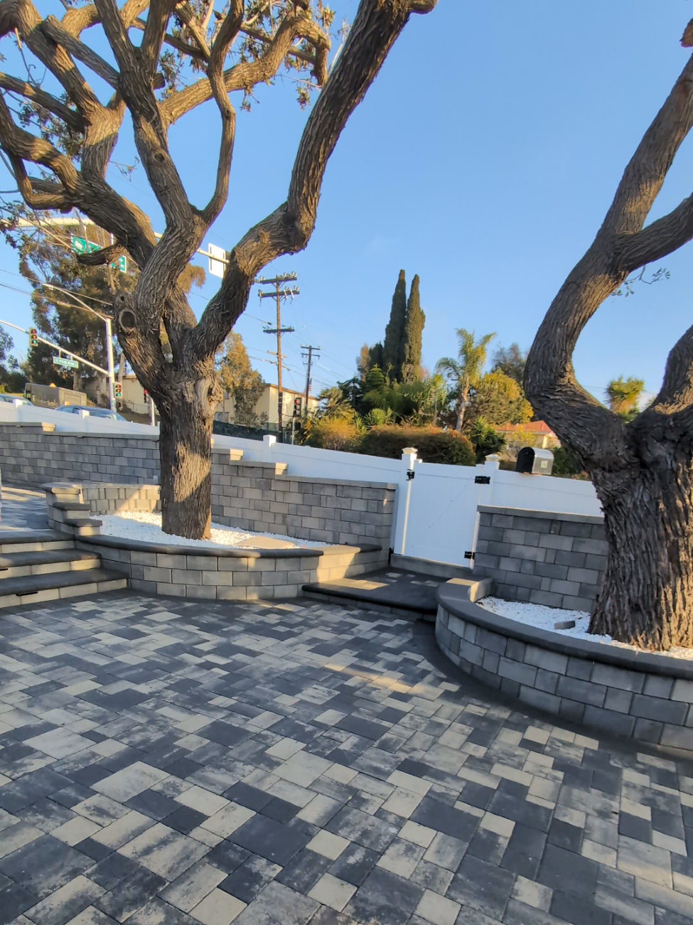 Complete Hardscape Transformation in San Diego: Paver Patios, Tiered Retaining Walls & Tree Rings