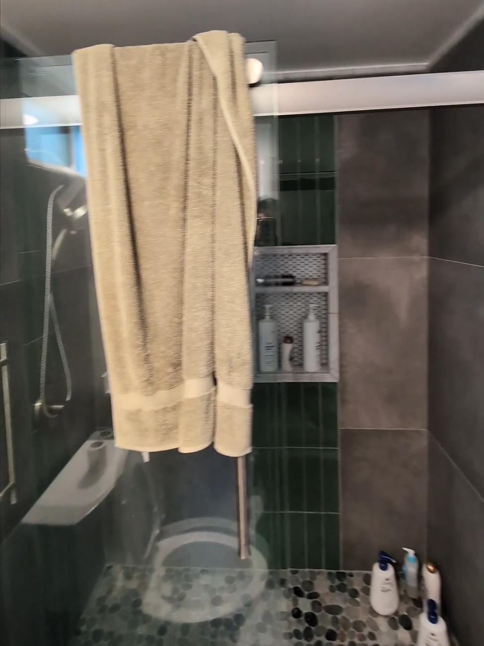 Natural Pebble Tile Walk-In Shower Remodel in San Diego: Dark Slate Porcelain & Custom Niches