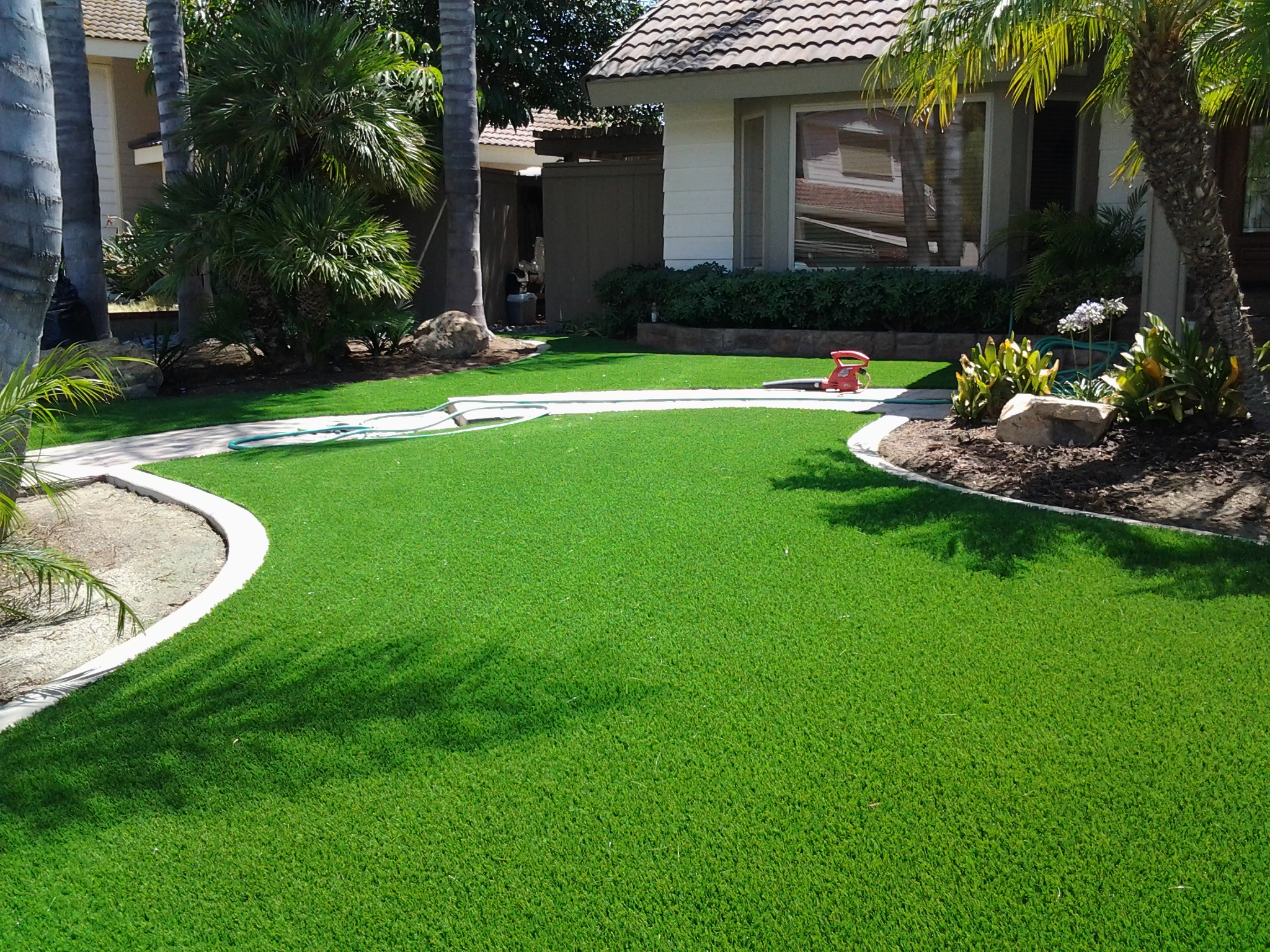 Artificial Turf Installation — San Diego Project vinyl plank flooring installed in San Diego home by Hardscape Flow