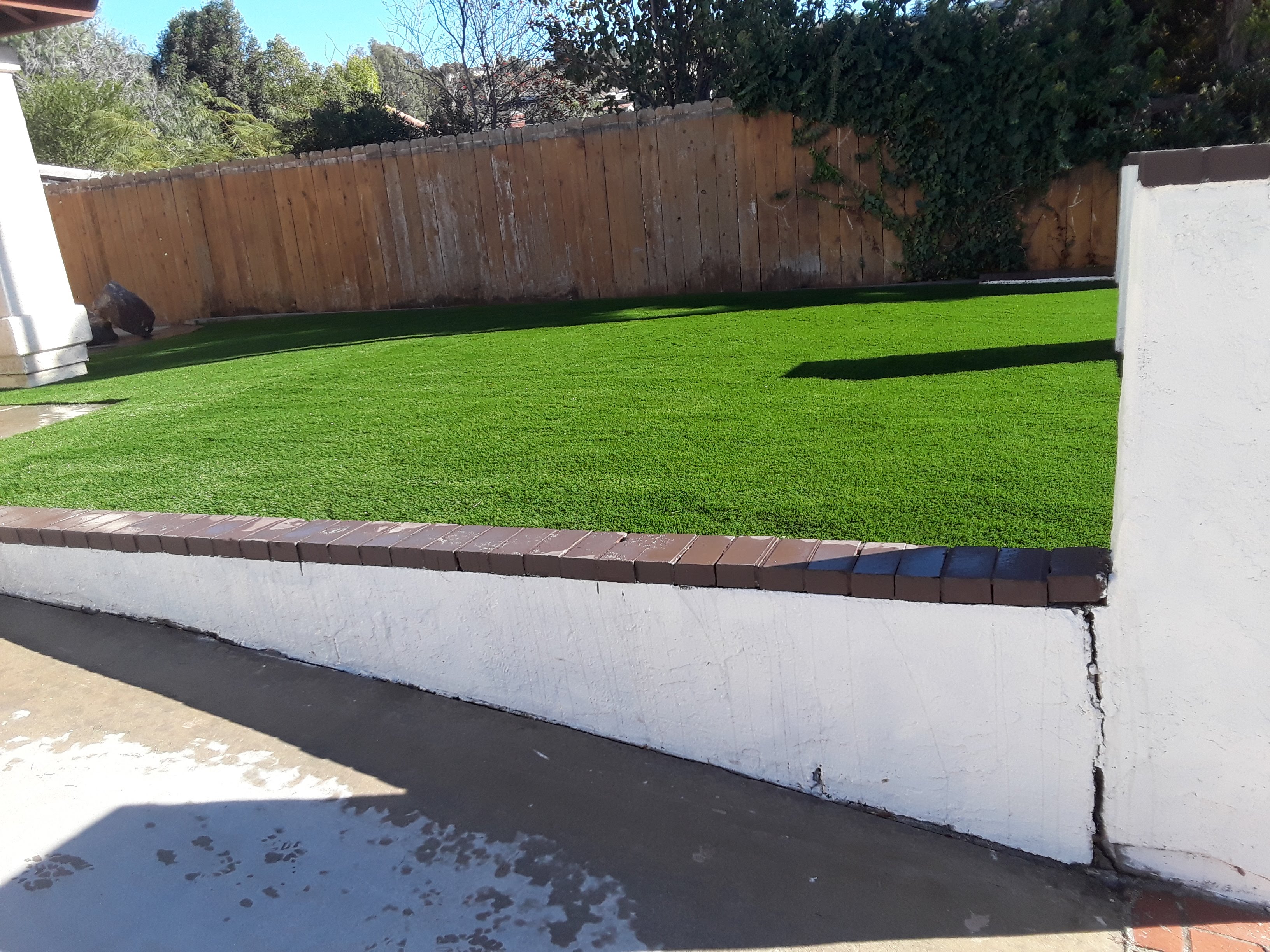Artificial Turf Installation — San Diego Project vinyl plank flooring installed in San Diego home by Hardscape Flow