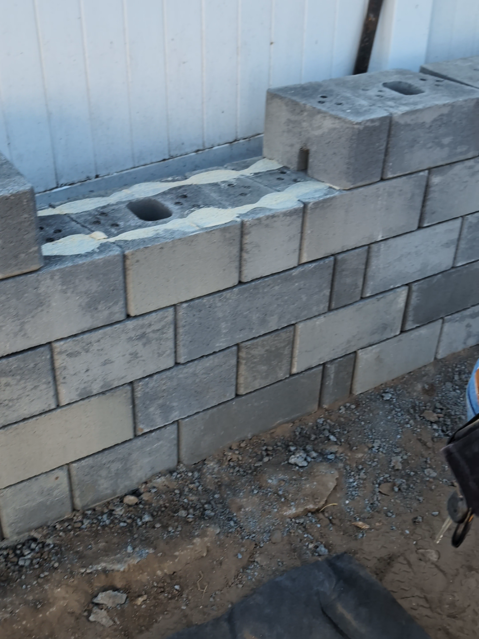 Rebuilding a Failing Retaining Wall: Segmental Block Stacking, Masonry Adhesive & Drainage in San Diego